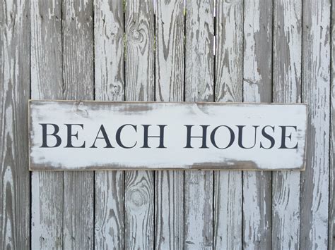 wooden exterior beach house signs